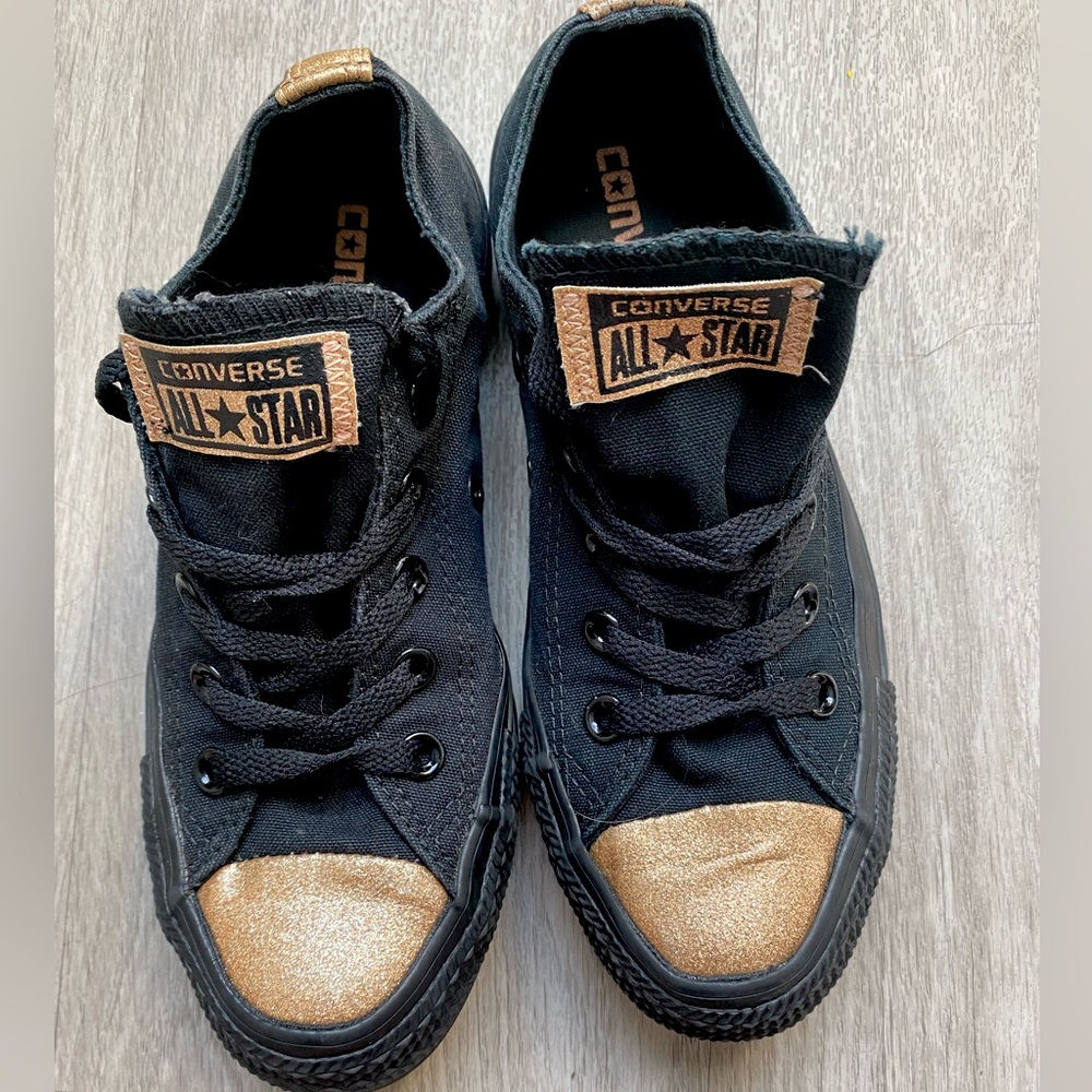 Black Converse with gold toe